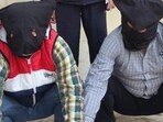 The accused in police custody. The accused in police custody.