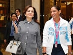 Nita Ambani and cricket captain Harmanpreet Kaur stunned in elegant style at TATA WPL player auction. Nita Ambani and cricket captain Harmanpreet Kaur stunned in elegant style at TATA WPL player auction.