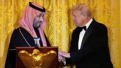 President Donald Trump shakes hands with Saudi Arabia's Crown Prince Mohammed bin Salman during a dinner in the East Room of the White House, Tuesday, Nov. 18, 2025, in Washington. AP/PTI(AP11_19_2025_000001B) (AP) President Donald Trump shakes hands with Saudi Arabia's Crown Prince Mohammed bin Salman during a dinner in the East Room of the White House, Tuesday, Nov. 18, 2025, in Washington. AP/PTI(AP11_19_2025_000001B) (AP)