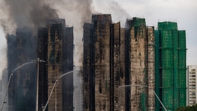 Firefighters work to extinguish a fire which broke out Wednesday at Wang Fuk Court, a residential estate in the Tai Po district of Hong Kong's New Territories, Thursday, Nov. 27, 2025. (AP Photo/Chan Long Hei) (AP) Firefighters work to extinguish a fire which broke out Wednesday at Wang Fuk Court, a residential estate in the Tai Po district of Hong Kong's New Territories, Thursday, Nov. 27, 2025. (AP Photo/Chan Long Hei) (AP)