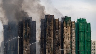Firefighters work to extinguish a fire which broke out Wednesday at Wang Fuk Court, a residential estate in the Tai Po district of Hong Kong's New Territories, Thursday, Nov. 27, 2025. (AP Photo/Chan Long Hei) (AP) Firefighters work to extinguish a fire which broke out Wednesday at Wang Fuk Court, a residential estate in the Tai Po district of Hong Kong's New Territories, Thursday, Nov. 27, 2025. (AP Photo/Chan Long Hei) (AP)