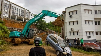 Indonesia is also facing massive floods and landslides after torrential rain in North Sumatra. (AFP) Indonesia is also facing massive floods and landslides after torrential rain in North Sumatra. (AFP)