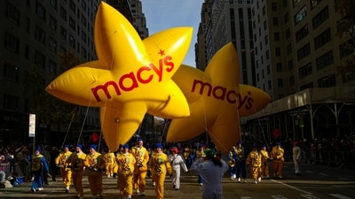 Balloon handlers guide the Macy's balloons down Sixth Avenue during the Macy's Thanksgiving Day Parade, Thursday, Nov. 27, 2025, in New York (AP) Balloon handlers guide the Macy's balloons down Sixth Avenue during the Macy's Thanksgiving Day Parade, Thursday, Nov. 27, 2025, in New York (AP)