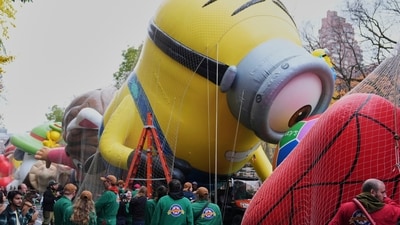 Volunteers work on the Stuart the Minion balloon during the nflation for the 99th Macy's Thanksgiving Day Parade (AP) Volunteers work on the Stuart the Minion balloon during the nflation for the 99th Macy's Thanksgiving Day Parade (AP)