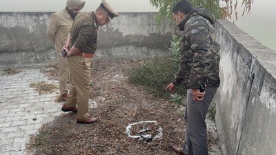 Police at the site of the shootout in Jalalabad sub-division of Fazilka district on Thursday. (HT Photo) Police at the site of the shootout in Jalalabad sub-division of Fazilka district on Thursday. (HT Photo)