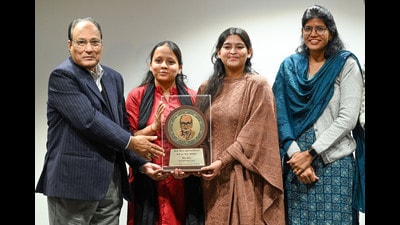 Suresh Rituparna, Director of the KK Birla Foundation (L), and Manju Bala, teacher in-charge of Vagmi (the debating society) (R), present a first prize to Lady Shri Ram College students, Arya Dixit along with Krishna Pathak during a Debate Competition by KK Birla Foundation at Hindu College on Wednesday. (Sanchit Khanna/HT) Suresh Rituparna, Director of the KK Birla Foundation (L), and Manju Bala, teacher in-charge of Vagmi (the debating society) (R), present a first prize to Lady Shri Ram College students, Arya Dixit along with Krishna Pathak during a Debate Competition by KK Birla Foundation at Hindu College on Wednesday. (Sanchit Khanna/HT)