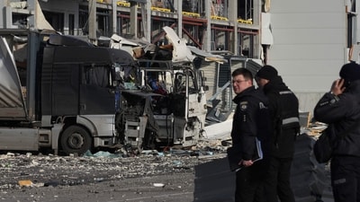 Law enforcement officers work at the site of the heavily damaged logistics hub of the Novus supermarket following Russian missiles and drones strikes in Kyiv on November 25, 2025, amid Russian invasion in Ukraine. (Photo by OLEKSII FILIPPOV / AFP) (AFP) Law enforcement officers work at the site of the heavily damaged logistics hub of the Novus supermarket following Russian missiles and drones strikes in Kyiv on November 25, 2025, amid Russian invasion in Ukraine. (Photo by OLEKSII FILIPPOV / AFP) (AFP)