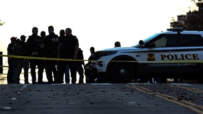 Law-enforcement officials visit the crime scene of a shooting in downtown Washington, DC, on November 26, 2025. (AFP) Law-enforcement officials visit the crime scene of a shooting in downtown Washington, DC, on November 26, 2025. (AFP)