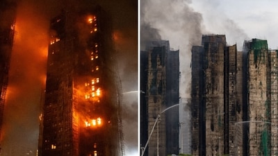 Firefighters work to extinguish a fire which broke out Wednesday at Wang Fuk Court, a residential estate in the Tai Po district of Hong Kong. (AP) Firefighters work to extinguish a fire which broke out Wednesday at Wang Fuk Court, a residential estate in the Tai Po district of Hong Kong. (AP)
