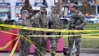 National Guard are seen after reports of two National Guard soldiers shot near the White House in Washington, Wednesday (AP) National Guard are seen after reports of two National Guard soldiers shot near the White House in Washington, Wednesday (AP)