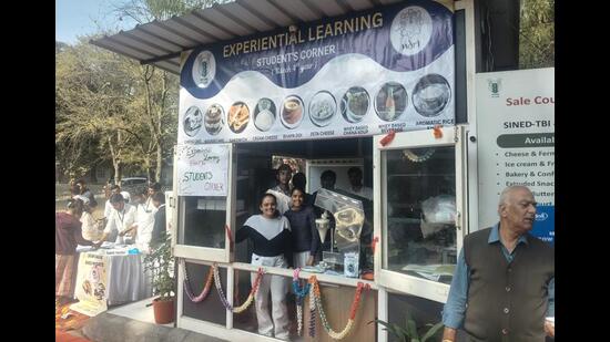 Students at a stall during the Dairy Festival 2025 in Karnal on Wednesday. (HT Photo)