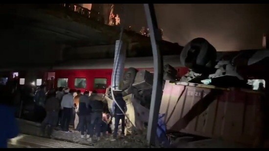 The fallen dumper next to the train (HT Photo)
