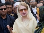 Bangladesh's former prime minister and Bangladesh Nationalist Party (BNP) chairperson Khaleda Zia, center, leaves after a court appearance in Dhaka, Bangladesh.