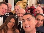 Cristiano Ronaldo takes a selfie with Georgina Rodriguez, Elon Musk, FIFA President Gianni Infantino and U.S. Secretary of Commerce Howard Lutnick.