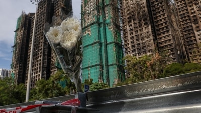 A total of 128 people have died after the massive fire at the Wang Fuk Court housing estate in Tai Po, Hong Kong (REUTERS)