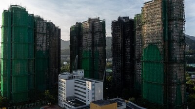 Burned buildings are stand in the aftermath of a fire at Wang Fuk Court, a residential estate in the Tai Po district of Hong Kong (AP) Burned buildings are stand in the aftermath of a fire at Wang Fuk Court, a residential estate in the Tai Po district of Hong Kong (AP)
