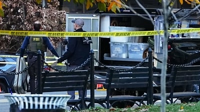 Agents with the Federal Bureau of Investigation (FBI) near the scene of a shooting in Washington, DC, US, on Wednesday, Nov. 26, 2025. Two National Guardsmen were shot in downtown Washington near the White House and a suspect is in custody, officials said Wednesday. Photographer: Aaron Schwartz/Bloomberg (Bloomberg) Agents with the Federal Bureau of Investigation (FBI) near the scene of a shooting in Washington, DC, US, on Wednesday, Nov. 26, 2025. Two National Guardsmen were shot in downtown Washington near the White House and a suspect is in custody, officials said Wednesday. Photographer: Aaron Schwartz/Bloomberg (Bloomberg)