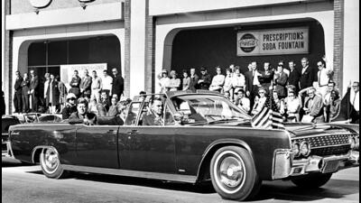 President John F Kennedy and Texas Governor John Connally ride in a convertible in a motorcade in Dallas on November 22, 1963 moments before a sniper's bullets would hit the two men, fatally wounding the President. (Bettmann Archive) President John F Kennedy and Texas Governor John Connally ride in a convertible in a motorcade in Dallas on November 22, 1963 moments before a sniper's bullets would hit the two men, fatally wounding the President. (Bettmann Archive)