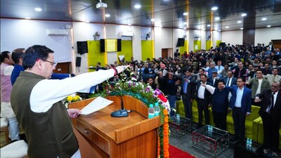 Uttarakhand CM Pushkar Singh Dhami administers the Preamble oath during Constitution Day observance at Dehradun Police Lines on Wednesday.