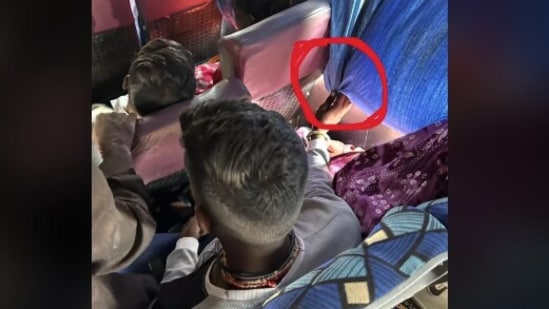 A man on a crowded bus held the window curtains for 40 minutes to shield his sleeping wife from sunlight. (Reddit/GiggityGlenn69)