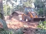 A large number of excavators and other machines are being used to pull down temporary sheds, bamboo huts and semi-permanent houses spread across the encroached area. A large number of excavators and other machines are being used to pull down temporary sheds, bamboo huts and semi-permanent houses spread across the encroached area.