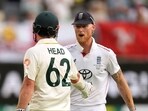 Ben Stokes shakes hands with Travis Head during the latter's century at Perth Stadium.