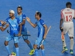 Indian players celebrate after scoring against Oman during their Junior World Cup match in Chennai on Saturday. (PTI)