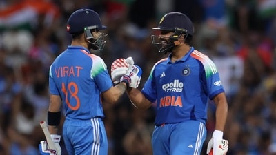 Rohit Sharma and Virat Kohli celebrate after winning the 3rd ODI match against Australia. (REUTERS)