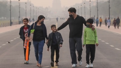 Gram it: To mask up or not? As Air Quality Index (AQI) remains in the ‘very poor’ category, here's how some visitors wear face masks while walking through smog near Rashtrapati Bhavan that's barely visible from the Kartavya Path. (Photo: Naveen Sharma/ANI ) Gram it: To mask up or not? As Air Quality Index (AQI) remains in the ‘very poor’ category, here's how some visitors wear face masks while walking through smog near Rashtrapati Bhavan that's barely visible from the Kartavya Path. (Photo: Naveen Sharma/ANI )