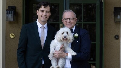Australian Prime Minister Anthony Albanese stands with his son Nathan and his dog, ring-bearer Toto, before the ceremony in Canberra.&nbsp; (via REUTERS)