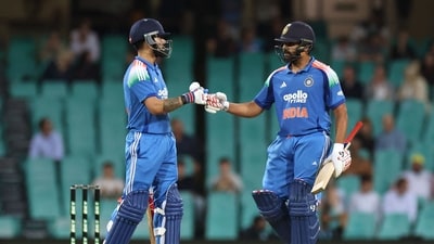 Virat Kohli celebrates a boundary with Rohit Sharma during the third one-day international between Australia and India. (AFP) Virat Kohli celebrates a boundary with Rohit Sharma during the third one-day international between Australia and India. (AFP)