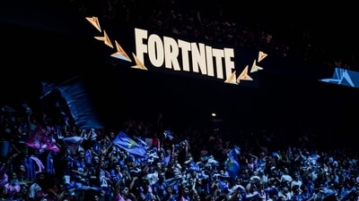 Fans cheer on their favorite team competing in The Fortnite Global Championship on September 7 (AFP) Fans cheer on their favorite team competing in The Fortnite Global Championship on September 7 (AFP)