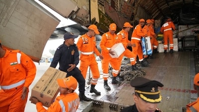 Two urban search and rescue teams comprising 80 National Disaster Response Force Personnel were sent by India to Sri Lanka for relief, along with a total of around 27 tons relief material delivered by air and sea. Cyclone Ditwah took shape over the southeast Bay of Bengal, intensifying into a severe cyclonic storm before curving toward Sri Lanka’s eastern coast. It ultimately made landfall near Trincomalee. Floodwaters swamped towns including the capital and disrupted daily life, with schools, transport, and businesses shut down. (AFP Photo) Two urban search and rescue teams comprising 80 National Disaster Response Force Personnel were sent by India to Sri Lanka for relief, along with a total of around 27 tons relief material delivered by air and sea. Cyclone Ditwah took shape over the southeast Bay of Bengal, intensifying into a severe cyclonic storm before curving toward Sri Lanka’s eastern coast. It ultimately made landfall near Trincomalee. Floodwaters swamped towns including the capital and disrupted daily life, with schools, transport, and businesses shut down. (AFP Photo)
