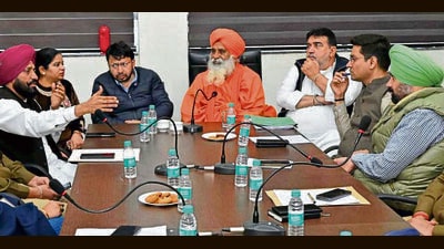 Rajya Sabha member Balbir Singh Seechewal and local bodies minister Ravjot Singh during a meeting with the officials in Ludhiana on Saturday. (HT Photo) Rajya Sabha member Balbir Singh Seechewal and local bodies minister Ravjot Singh during a meeting with the officials in Ludhiana on Saturday. (HT Photo)