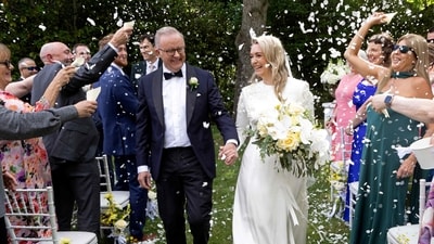 Australian Prime Minister Anthony Albanese married his partner Jodie Haydon in a private ceremony at The Lodge in Canberra on Saturday, becoming the first serving Australian prime minister to wed while in office in the 124-year history of the country's federal government. Picture shows Albanese and his new wife Jodie Haydon walk together during their wedding ceremony in Canberra on November 29, 2025. (AFP) Australian Prime Minister Anthony Albanese married his partner Jodie Haydon in a private ceremony at The Lodge in Canberra on Saturday, becoming the first serving Australian prime minister to wed while in office in the 124-year history of the country's federal government. Picture shows Albanese and his new wife Jodie Haydon walk together during their wedding ceremony in Canberra on November 29, 2025. (AFP)