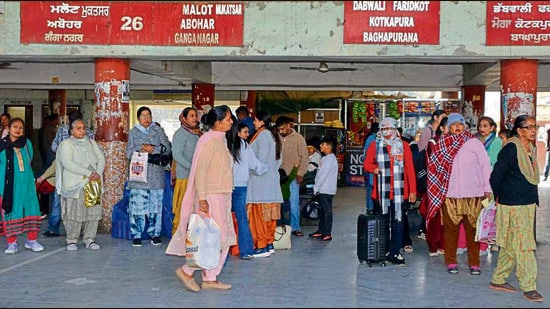 Commuters stranded at the ISBT in Ludhiana on Saturday. (Manish/HT)