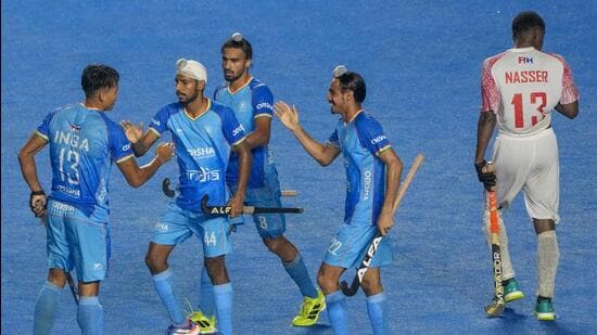 Indian players celebrate after scoring against Oman during their Junior World Cup match in Chennai on Saturday. (PTI)