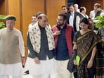 Union ministers Rajnath Singh and Arjun Ram Meghwal with other MPs ahead of the all-party meeting on the eve of Parliament's winter session in New Delhi on Sunday, November 30, 2025. 