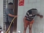 Safiudeen Pakkeer Mohamed, 39, was attacked and humiliated for sleeping outside an AmBank branch in Malaysia. Safiudeen Pakkeer Mohamed, 39, was attacked and humiliated for sleeping outside an AmBank branch in Malaysia.
