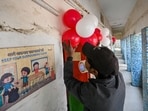New Delhi, India - Nov. 29, 2025: Workers seen decorating a modern booth as a part of preparations, a day before MCD bypoll elections at Angoori Bagh in New Delhi, India, on Saturday, November 29, 2025. (Photo by Sanchit Khanna/ Hindustan Times) New Delhi, India - Nov. 29, 2025: Workers seen decorating a modern booth as a part of preparations, a day before MCD bypoll elections at Angoori Bagh in New Delhi, India, on Saturday, November 29, 2025. (Photo by Sanchit Khanna/ Hindustan Times)
