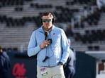 Athletic Director Keith Carter of the Mississippi Rebels looks on before the game against the Mississippi State Bulldogs 