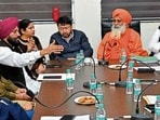 Rajya Sabha member Balbir Singh Seechewal and local bodies minister Ravjot Singh during a meeting with the officials in Ludhiana on Saturday. (HT Photo) Rajya Sabha member Balbir Singh Seechewal and local bodies minister Ravjot Singh during a meeting with the officials in Ludhiana on Saturday. (HT Photo)