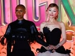British actress Cynthia Erivo and US singer-songwriter Ariana Grande attend the premiere of 