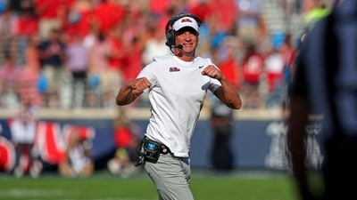 Head coach Lane Kiffin of the Mississippi Rebels reacts after his defense makes a fourth down stop in the third quarter of the game against the Citadel Bulldogs at Vaught-Hemingway Stadium on November 8, 2025 in Oxford, Mississippi. (Getty Images via AFP)