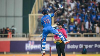 India's Virat Kohli celebrates after scoring a century during the first ODI against South Africa at the JSCA International Stadium in Ranchi on November 30, 2025. (AFP)