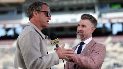 Marty Smith of the SEC Network interviews head coach Lane Kiffin (Getty Images via AFP) Marty Smith of the SEC Network interviews head coach Lane Kiffin (Getty Images via AFP)