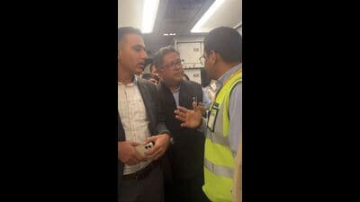 Passengers arguing with cabin crew aboard the flight. (HT) Passengers arguing with cabin crew aboard the flight. (HT)