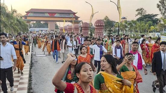 Students of Bodoland University take part in a protest against the Assam cabinet's approval of a report on granting ST status to six communities of the state, in Kokrajhar, on Saturday. (PTI)