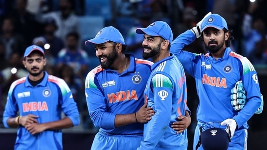 Rohit Sharma and Virat Kohli celebrate for India in an ODI match in the Champions Trophy. (AFP)