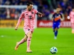 Inter Miami CF forward Lionel Messi (10) dribbles against FC Cincinnati.